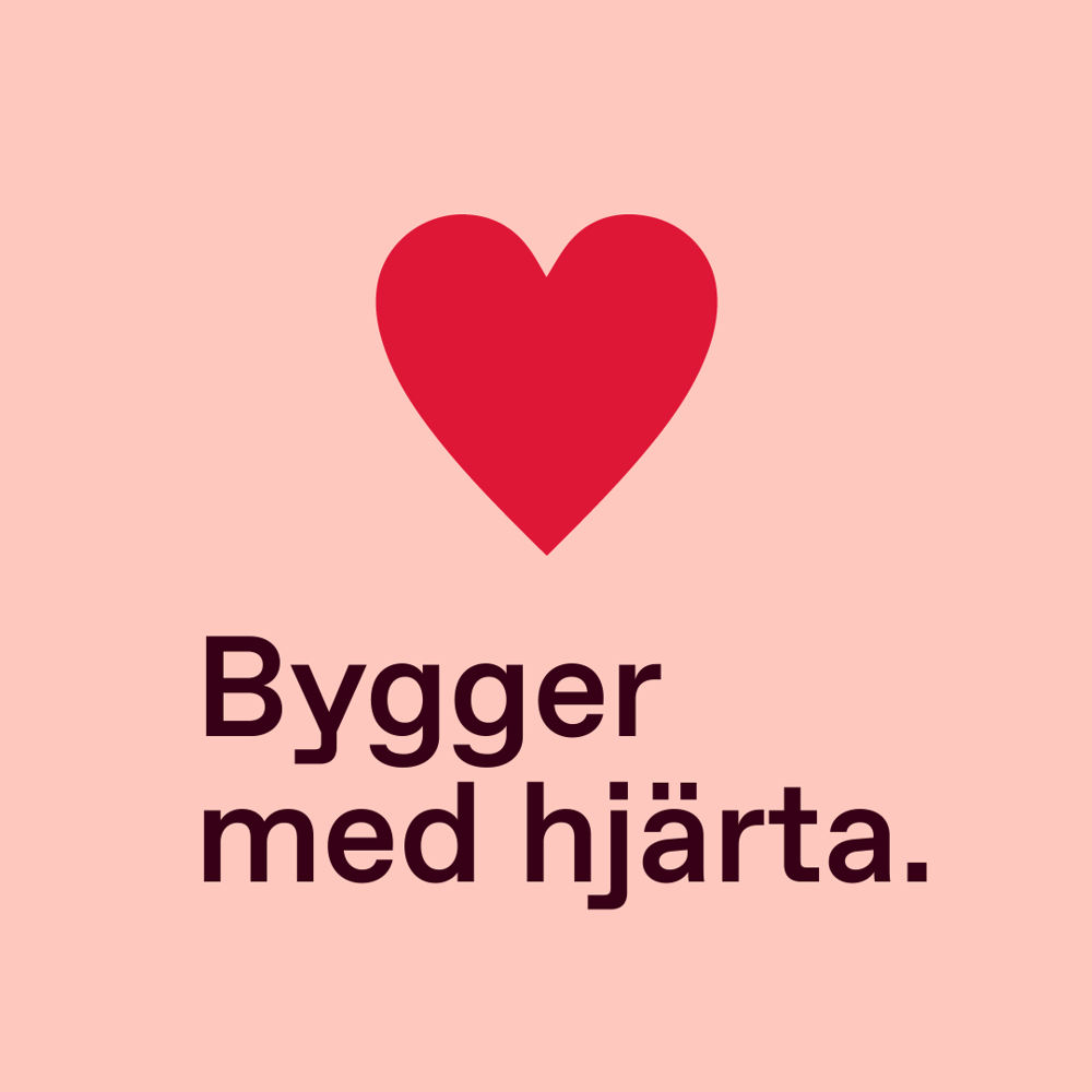 Drönarbild över medarbetare på Veidekke som stor i formation av ett hjärta.