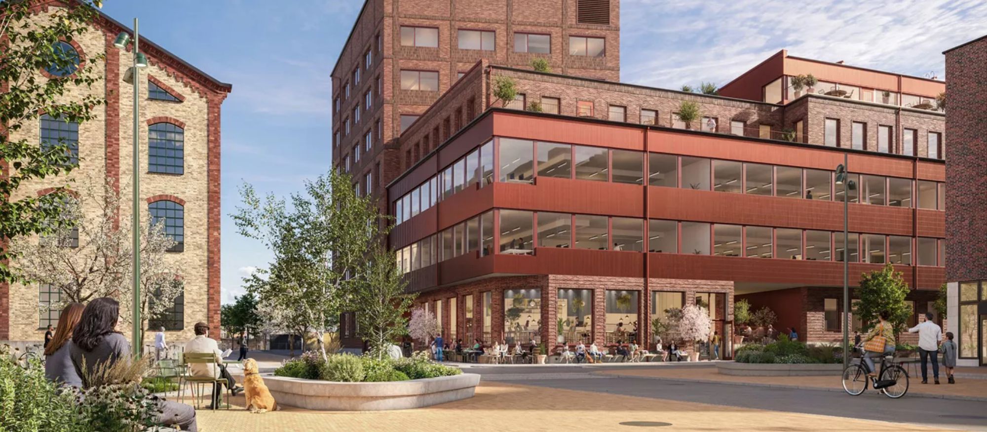 Arkitektskiss som visar modern kontorsbyggnad med rödbrun fasad i stadsmiljö.