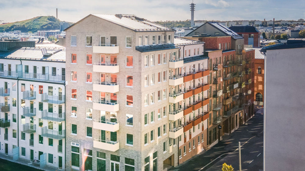Foto av flerbostadshus.
