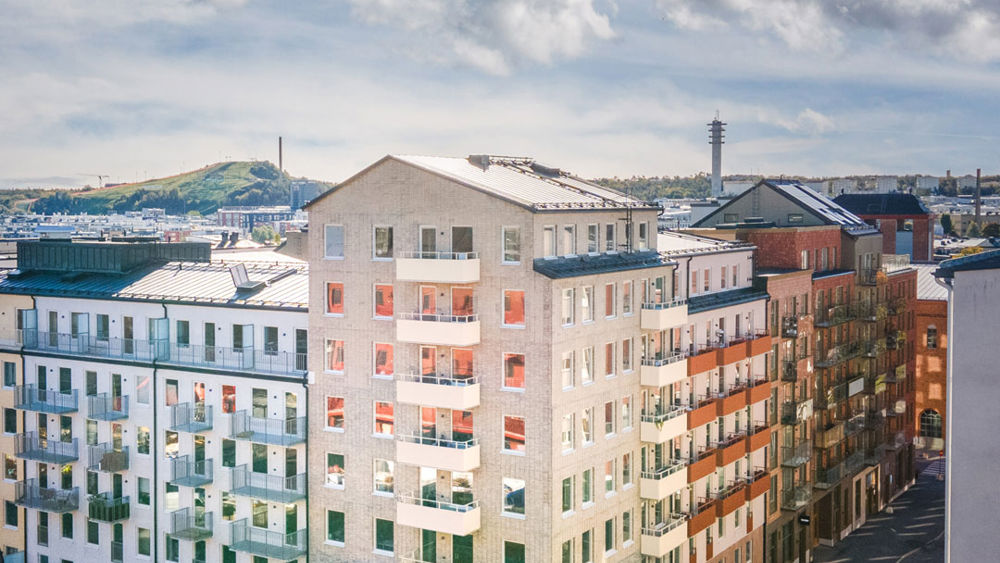 Foto av flerbostadshus.