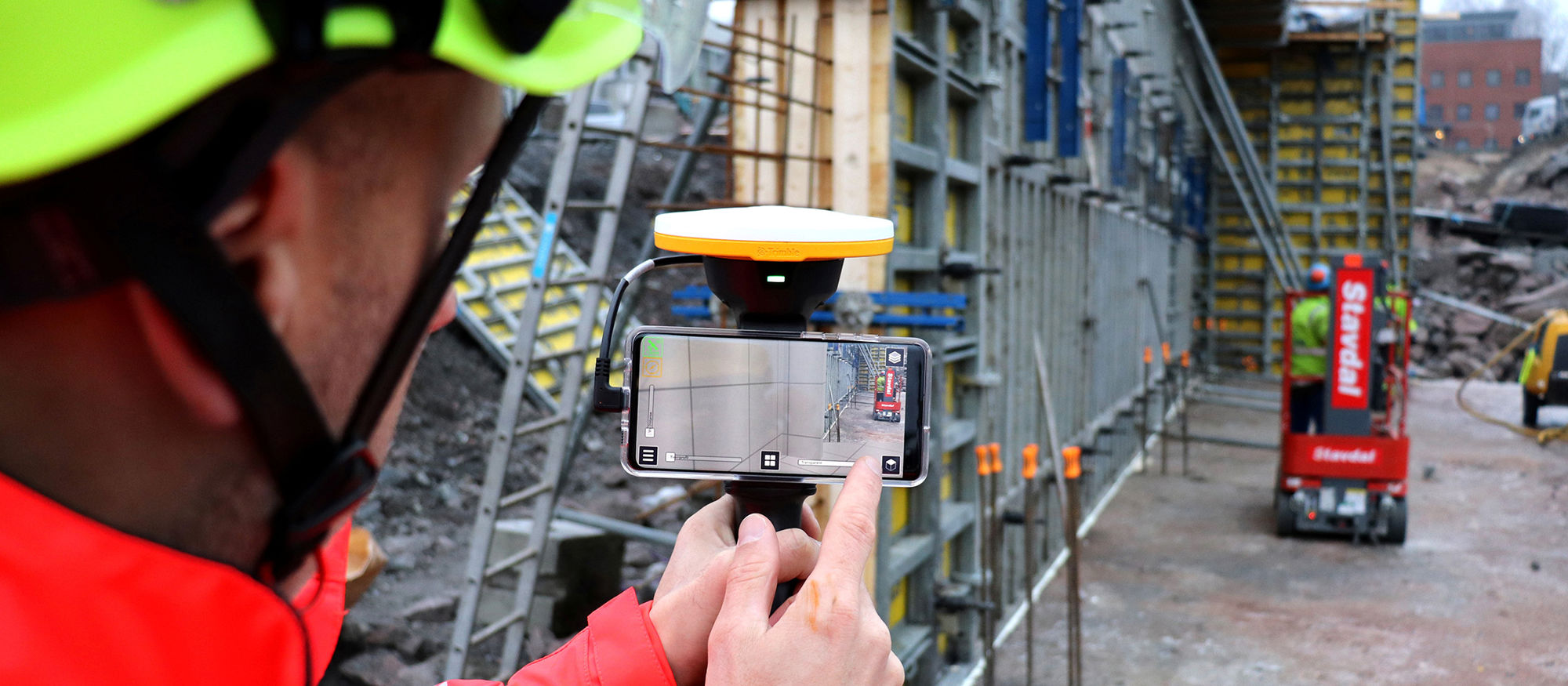 Användning av  augmented reality på en byggarbetsplats.